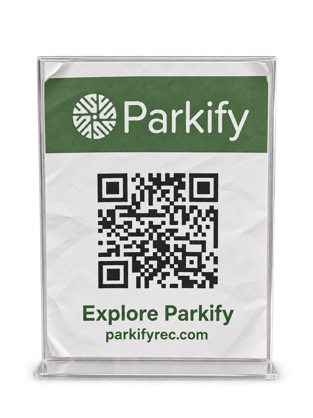 A wrinkled Parkify paper QR sign in a clear plastic holder